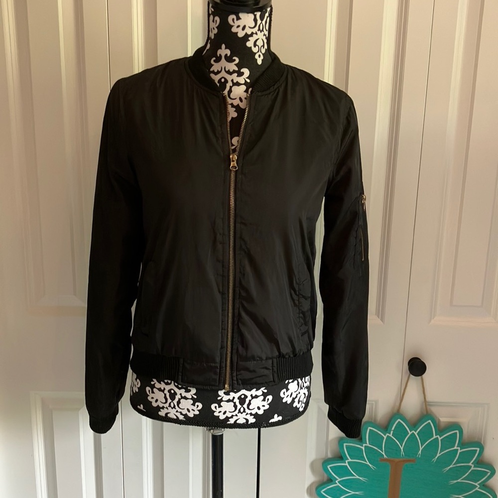 Black New Look bomber jacket with front zip and zip on sleeve